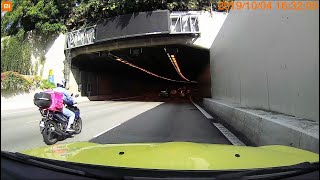 4oct2019 cte tunnel  metal plates falling out of lorry just missing camcar and nearby vehicles.