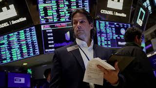 Stocks end lower as investors digest economic data
