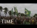 Thousands March To Support Brazilian President Bolsonaro Amid Widespread Criticism Of Him | TIME