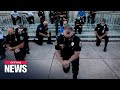 Police kneel in New York; take part in George Floyd protest which spread to over 140 cities