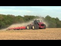 Versatile 575 Tractor pulling a 40' Kuhn Krause Excelerator in Indiana