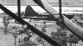 First Air Commando Stinson L-5 plane performs an aerial message pickup in Central...HD Stock Footage