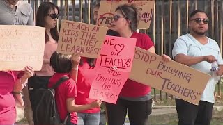 Parents from two HISD protest