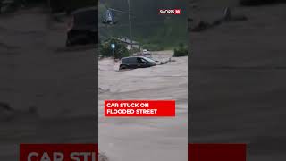 Shorts | Slovenia: Woman Rescued From Submerged Car As Heavy Rains Cause Flash Floods | News18