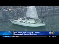 sail boat gets stuck under roosevelt island bridge