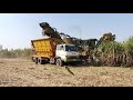 รถตัดอ้อยระบบสายพานลำเลียง ทีมงานพูนทรัพย์พืชผล sugarcane harvester