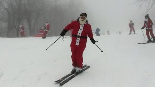 300 skiing Santas take over a Maine ski resort in the United States | AFP