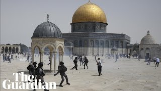 Palestinians and Israeli police clash at Jerusalem's al-Aqsa mosque hours after Gaza truce