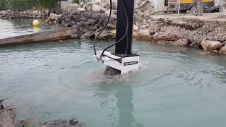 Kemroc EK140 Chain Cutter on CAT330D  excavating rock underwater 1