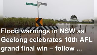 Flood warnings in NSW as Geelong celebrates 10th AFL grand final win – follow live