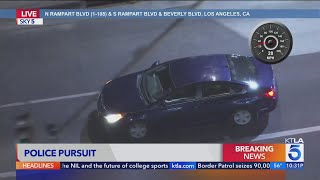 Police pursue armed robbery suspect in L.A.
