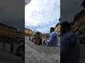 Enjoying Gelato at the steps of the Basilica of Santa Croce in Florence, Italy