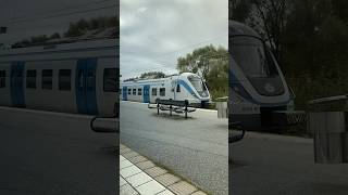 Pendeltåg to Bålsta departing from Bro filmed from a pendeltåg to Vasterhaninge (line 43)