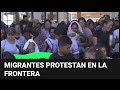 “Queremos pasar”: cientos de migrantes se amotinan en un puente fronterizo entre EEUU y México