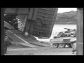 loading of a us lst landing ship tank with army vehicles at falmouth england ...hd stock footage