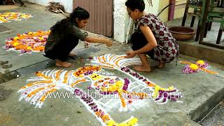 South Indian women make Rangoli during Pongal festival, Pondicherry