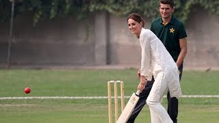 Duchess of Cambridge laughs as she and Prince William play cricket on their royal visit to Pakistan