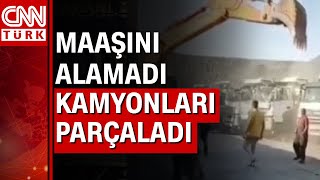 Maaşını alamayan kepçe operatörü kamyonları ezdi!