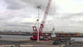 Loading. MANITOWOC crane on a barge