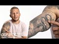 UFC Champion TJ Dillashaw Breaks Down His Tattoos | GQ Sports