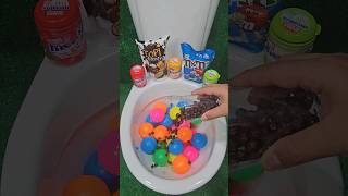 Will it flush? M&Ms vs Colored Balls and Mentos in Toilet