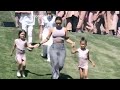 Kim Kardashian Running Down A Hill With Children while Kanye performs At Sunday Service In Coachella