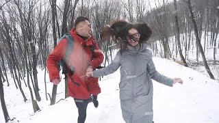 Couple Run In Winter Woods Stock Video