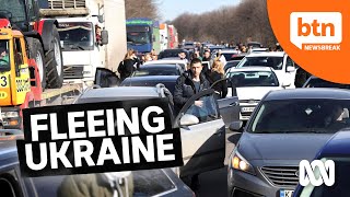 Thousands Flee Ukraine After Russian Invasion & Missile Strikes