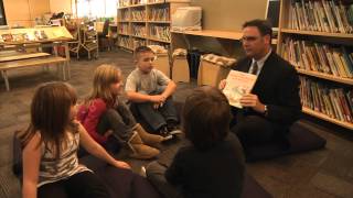 Minister McRae leads reading discussion at James Park Elementary