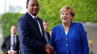 Merkel urges more investment, weapons for Africa