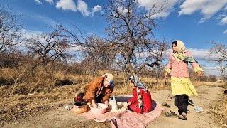 Rural family life: baking bread in an old traditional oven in rural life