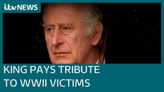 Charles pays tribute to WWII victims on first trip to Germany as King | ITV News