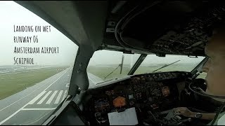 Holding at RIVER and landing at wet runway 06 Amsterdam Airport Schiphol (AMS EHAM).