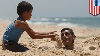 Sand tunnel collapse kills man on popular North Carolina beach