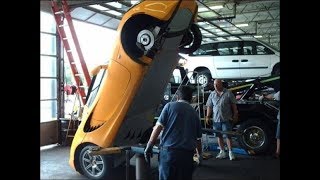 Cars falling off lifts/garage hoists (#1)