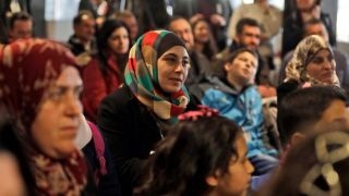 Do refugees have the same rights as US citizens?