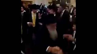 Rabbi Fishbain dancing with chosson at einekel's chasunah