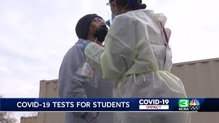 Schools wait on at-home COVID-19 tests for students returning from winter break