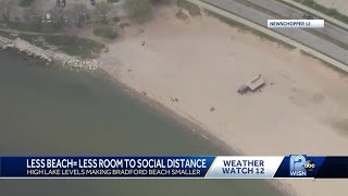 Near-record lake levels reduce beach space