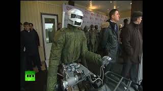 Putin visits Russian military robot