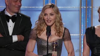 Madonna winning Golden Globe Award for the Best Original Song in 2012
