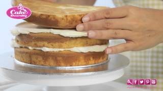 Crumb coating a cake with buttercream