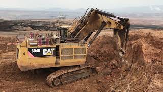 Caterpillar 6040 Mining Excavator Loading Hitachi Dumpers And Operator View