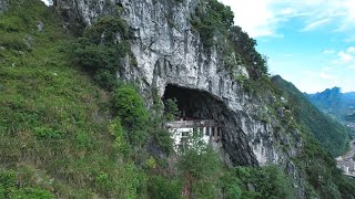 House in A Mysterious Cave