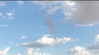 What is this strange funnel cloud in the sky?