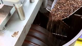 How chocolate is made on stone grinder melanger from  cocoa nibs