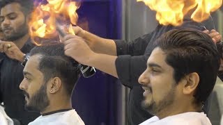 Indian barber cuts men's hair by setting it on fire