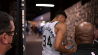 Giannis casually saves a fan's phone as he exits the court!😮😀 Nets vs Bucks Game 4
