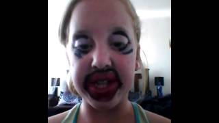 Really funny make up tutorial. Big bold lips.