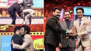 Dhanush Touches Mohanlals Feet and Says its a Jackpot To Receive An Award From Him